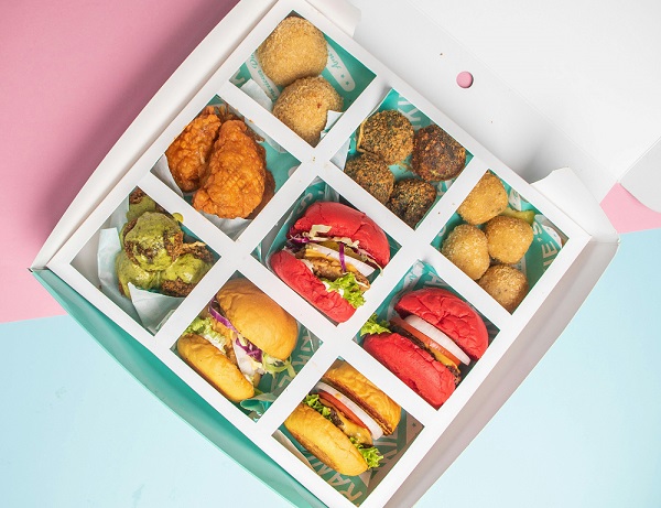 Snack platter at a restaurant, including burgers.