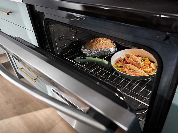 Ceramic and aluminum foil containers are heated together in the oven.