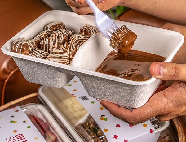 Sustainable disposable food containers and forks.