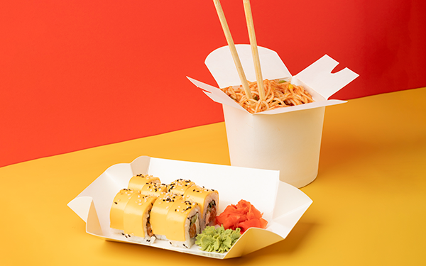 Chinese takeout in white cardbaord containers