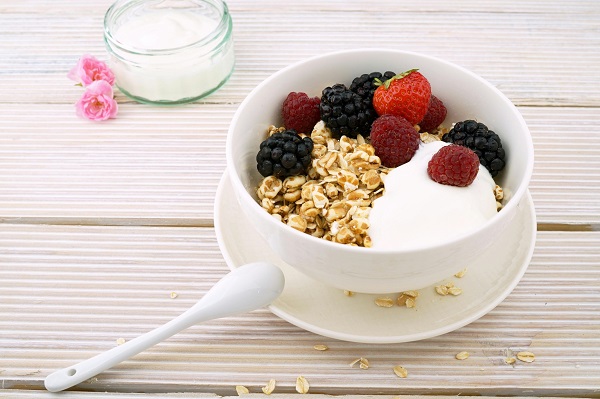 White cereal bowls and spoons