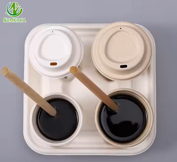 Disposable coffee cups, straws, lids and holders made from bagasse.