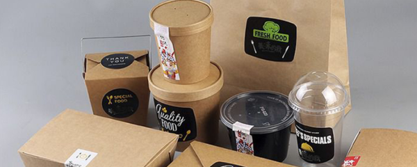 Food items packed with paper packaging and sealed with labels and stickers