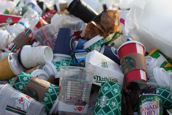 Plastic cups and plastic-coated coffee cups make waste management difficult.