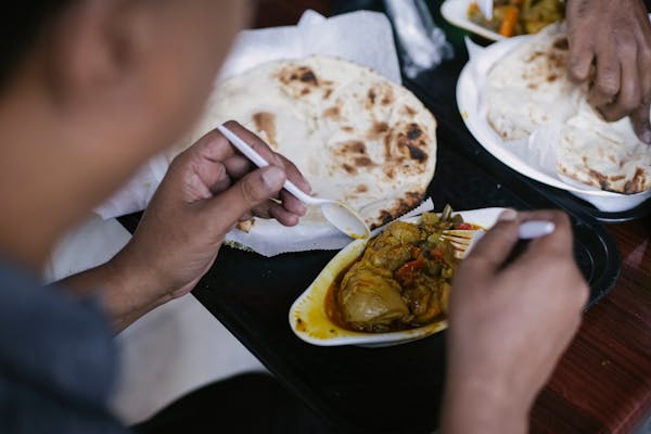 People having a meal in Sugarcane fiber bagasse products