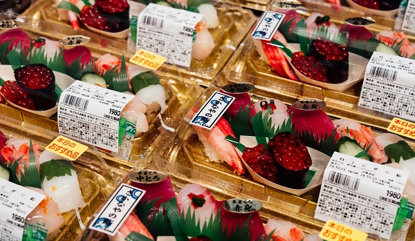 Sushi packaged and brought for sale in supermarkets and hibachi restaurants.