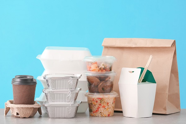 Different types of disposable food containers, including paper bags, Chinese takeaway boxes, clamshell containers and soup bowls.